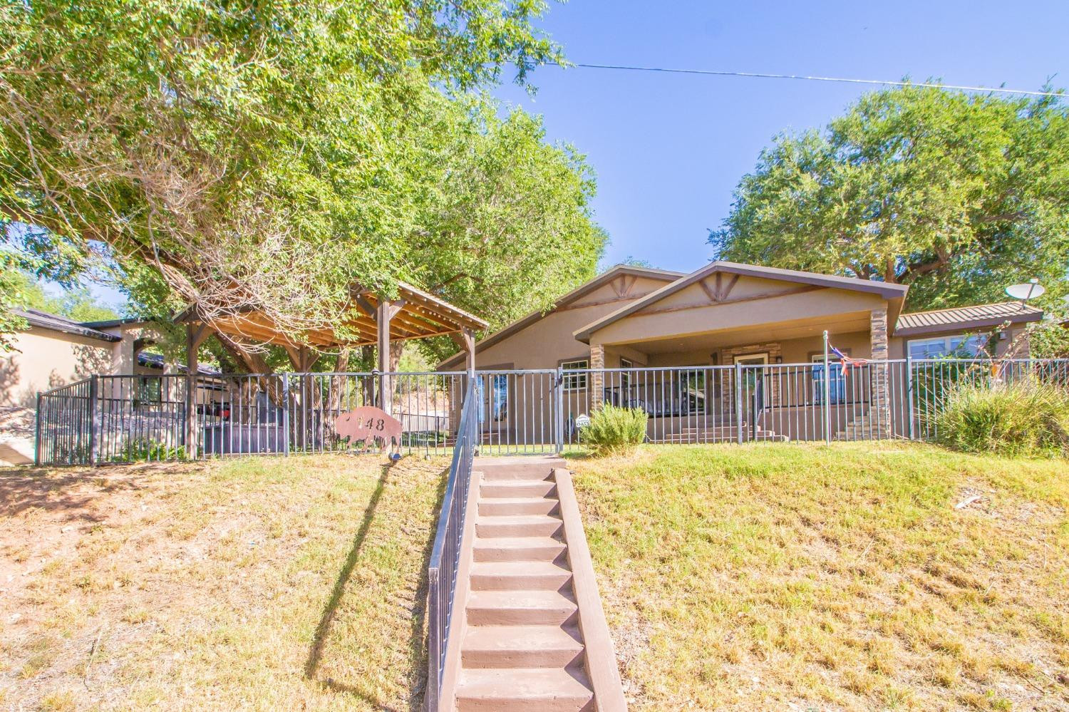 148 Pony Express Trail Lubbock, TX 79404 - Photo 26 of 29 a view of a house with a yard