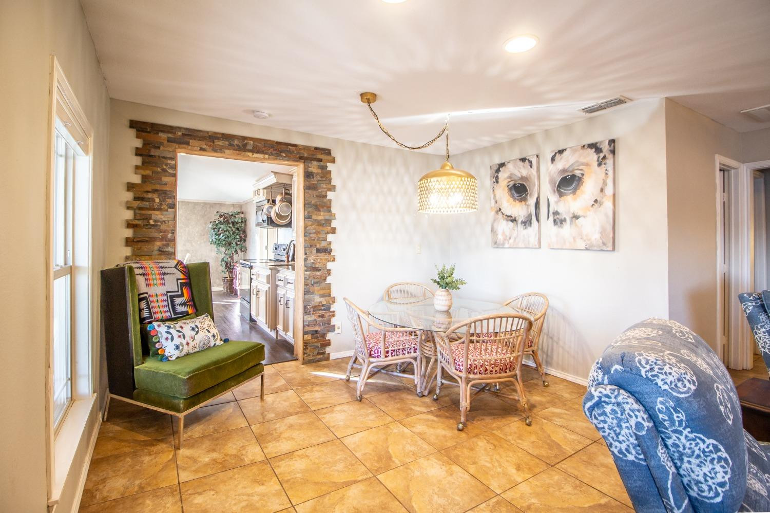 148 Pony Express Trail Lubbock, TX 79404 - Photo 7 of 29 a living room with furniture and wooden floor