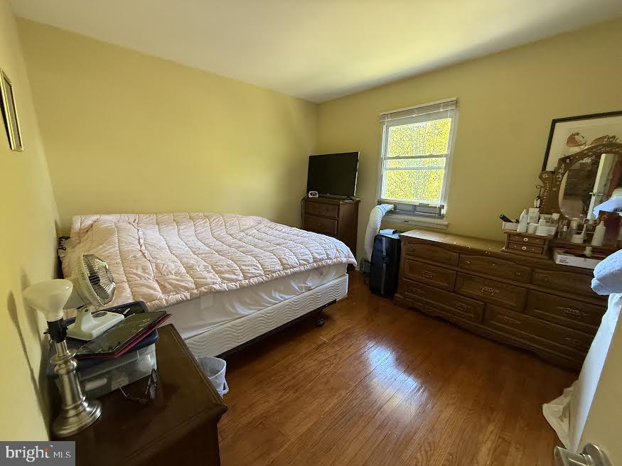 111 Huckleberry Lane Browns Mills, NJ 08015 - Photo 15 of 28 a bedroom with a bed and a flat tv screen on dresser