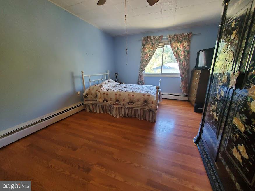 111 Huckleberry Lane Browns Mills, NJ 08015 - Photo 16 of 28 a bedroom with a bed next to a window