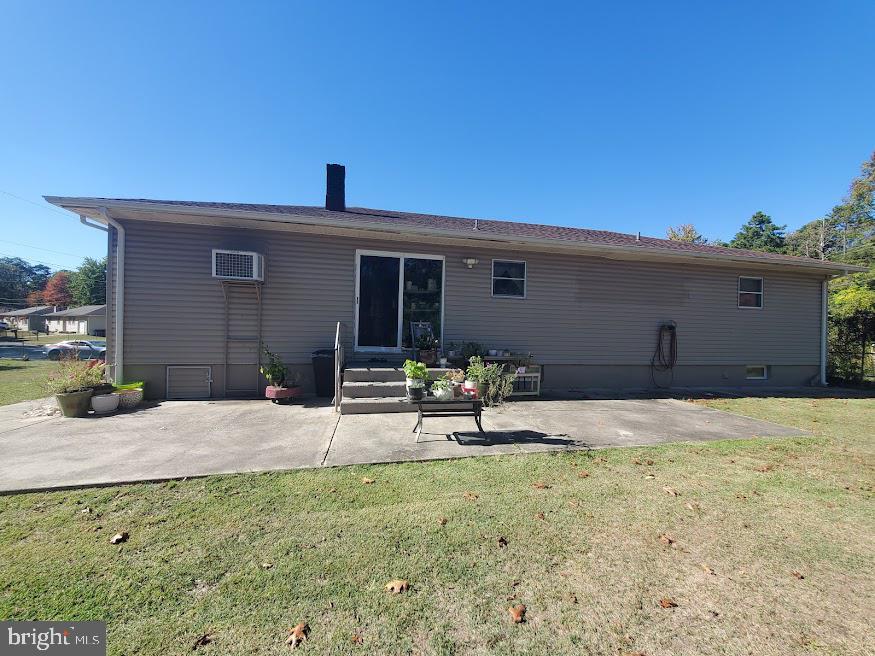 111 Huckleberry Lane Browns Mills, NJ 08015 - Photo 25 of 28 a backyard of a house with table and chairs