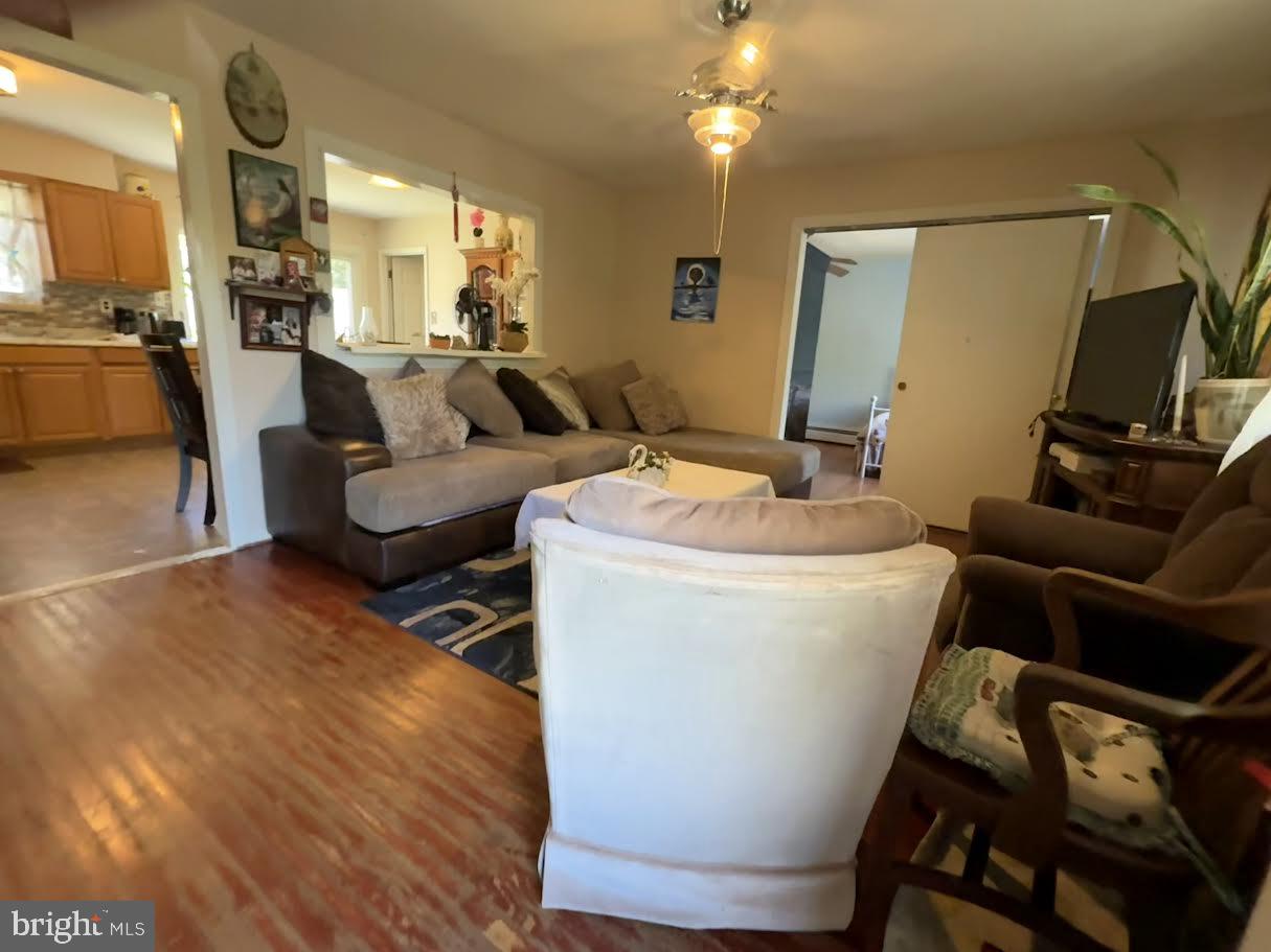 111 Huckleberry Lane Browns Mills, NJ 08015 - Photo 8 of 28 a living room with furniture and a flat screen tv