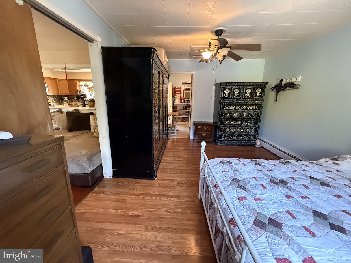 111 Huckleberry Lane Browns Mills, NJ 08015 - Photo 9 of 28 a bedroom with a bed dresser and a large mirror