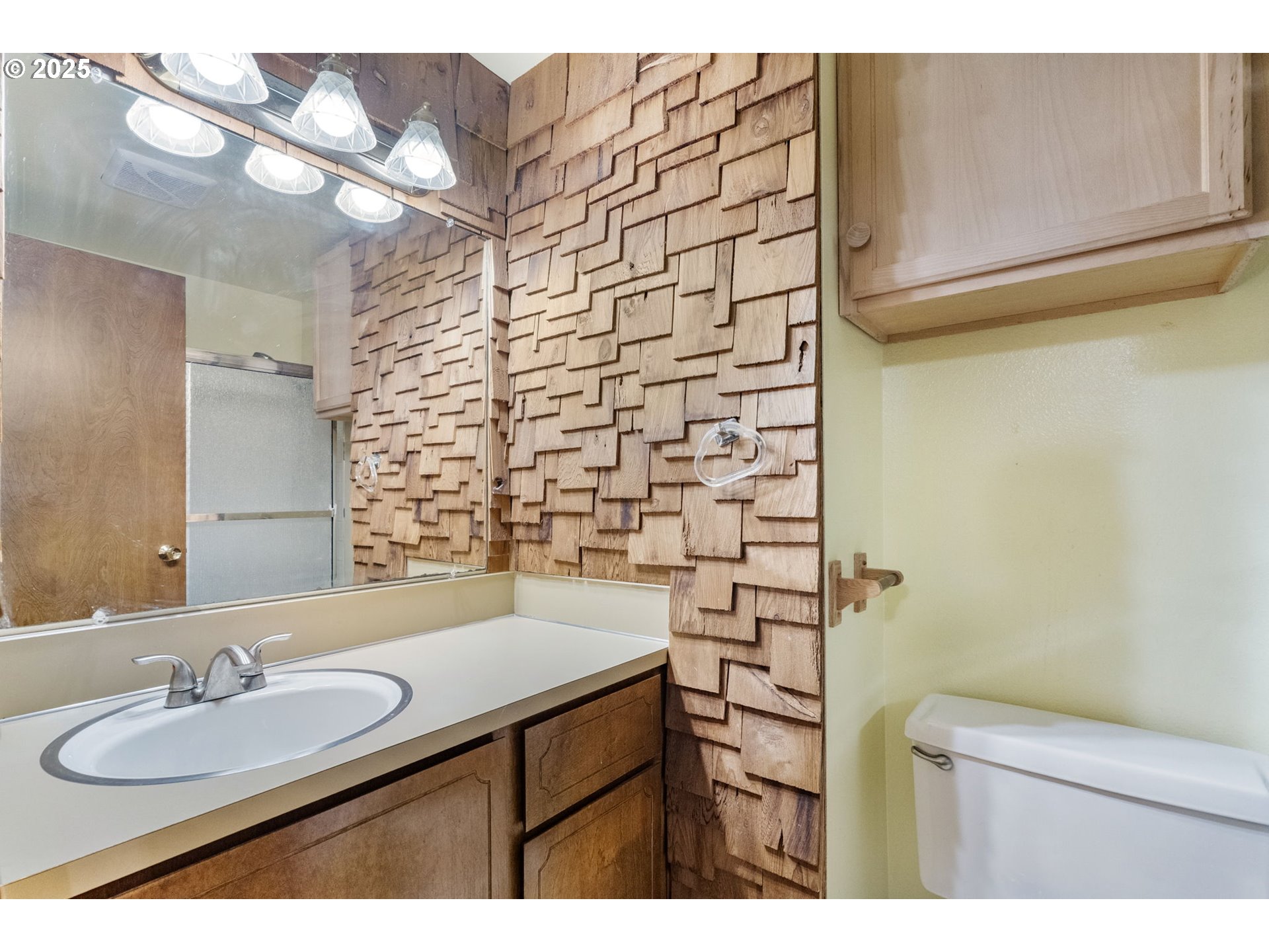470 Southwest 194th Court Beaverton, OR 97006 - Photo 20 of 31 a bathroom with a sink and a mirror