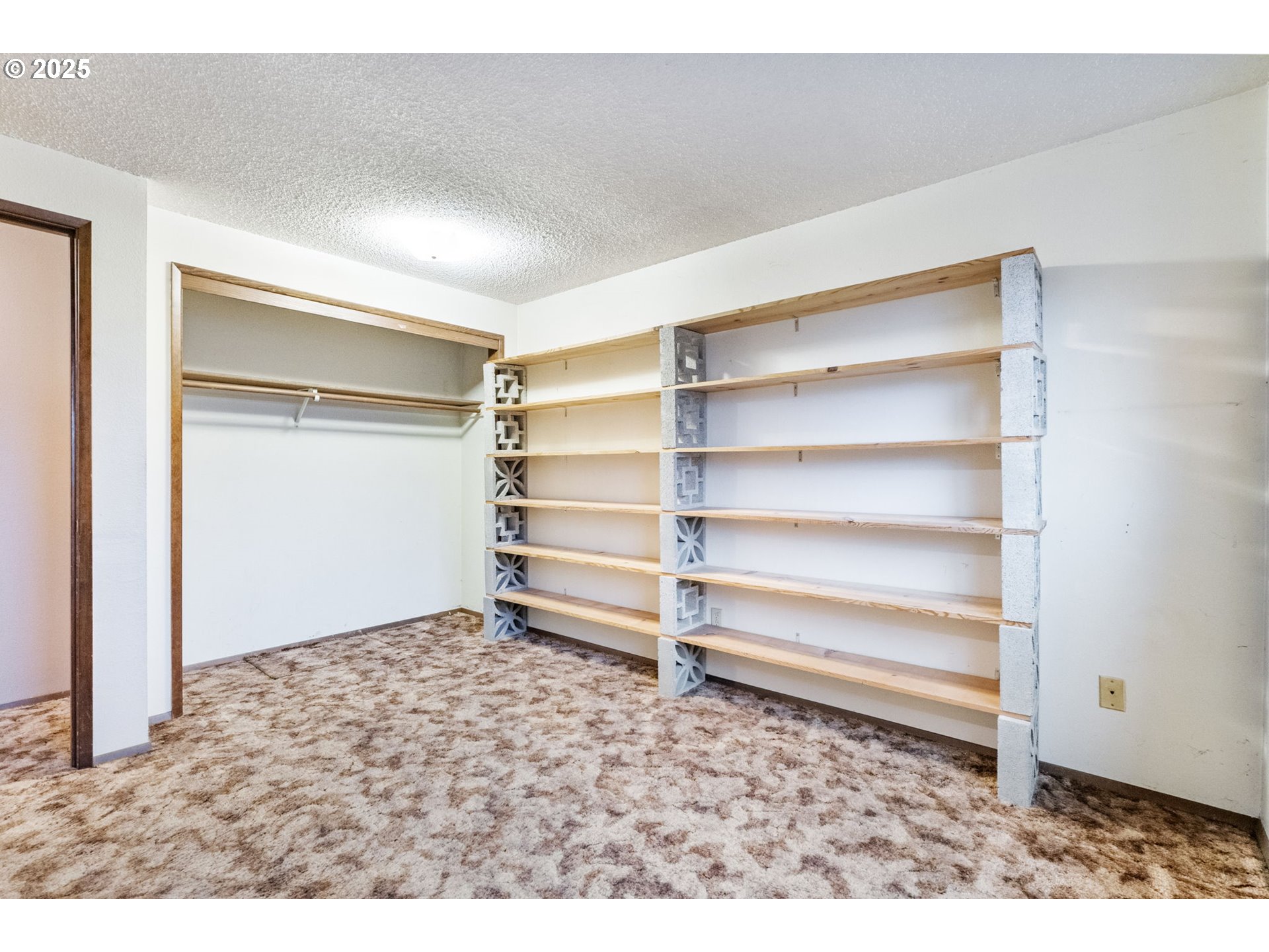 470 Southwest 194th Court Beaverton, OR 97006 - Photo 22 of 31 a room with a wooden floor and a window