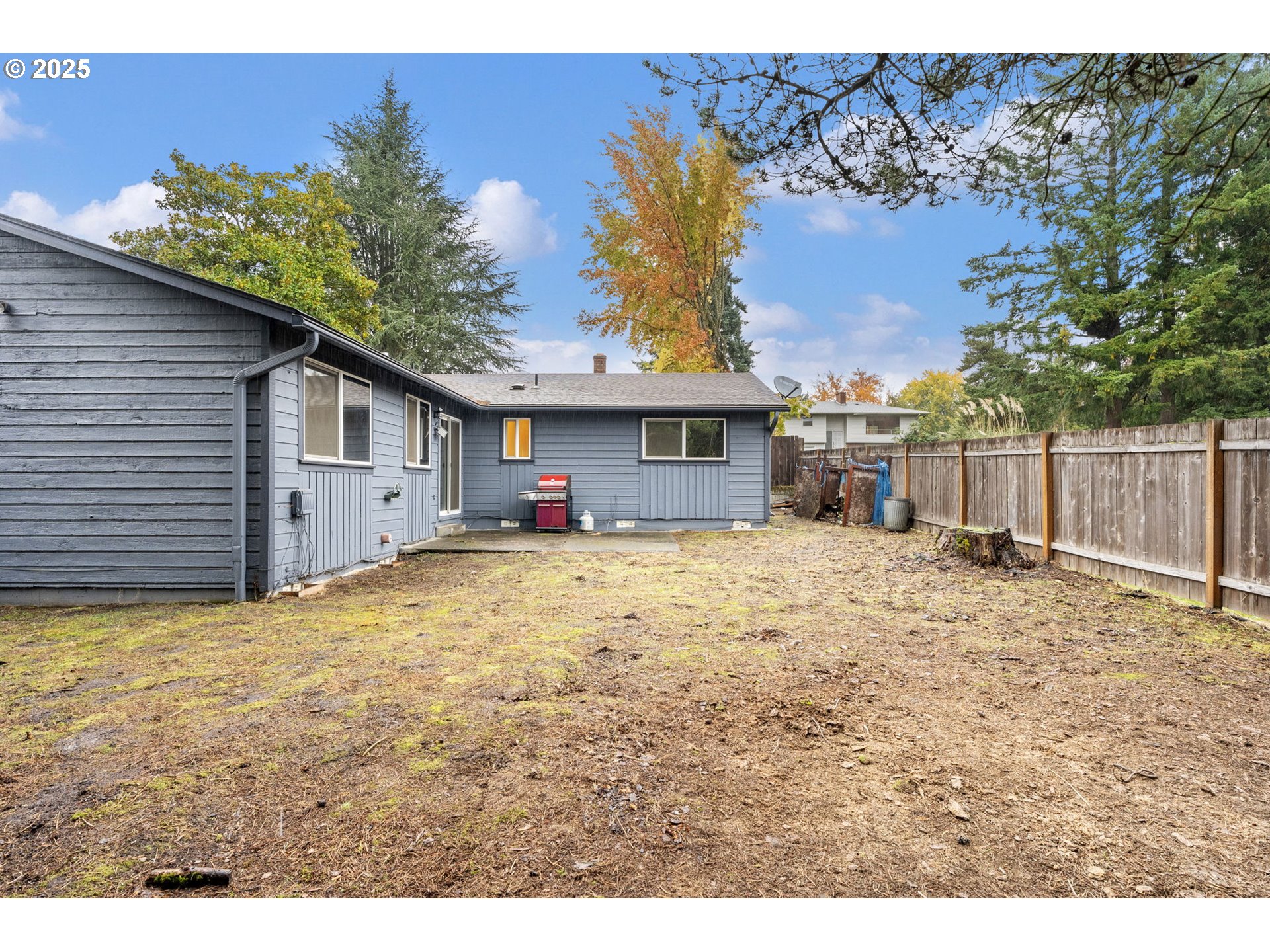 470 Southwest 194th Court Beaverton, OR 97006 - Photo 27 of 31 a view of a house with a yard and garage