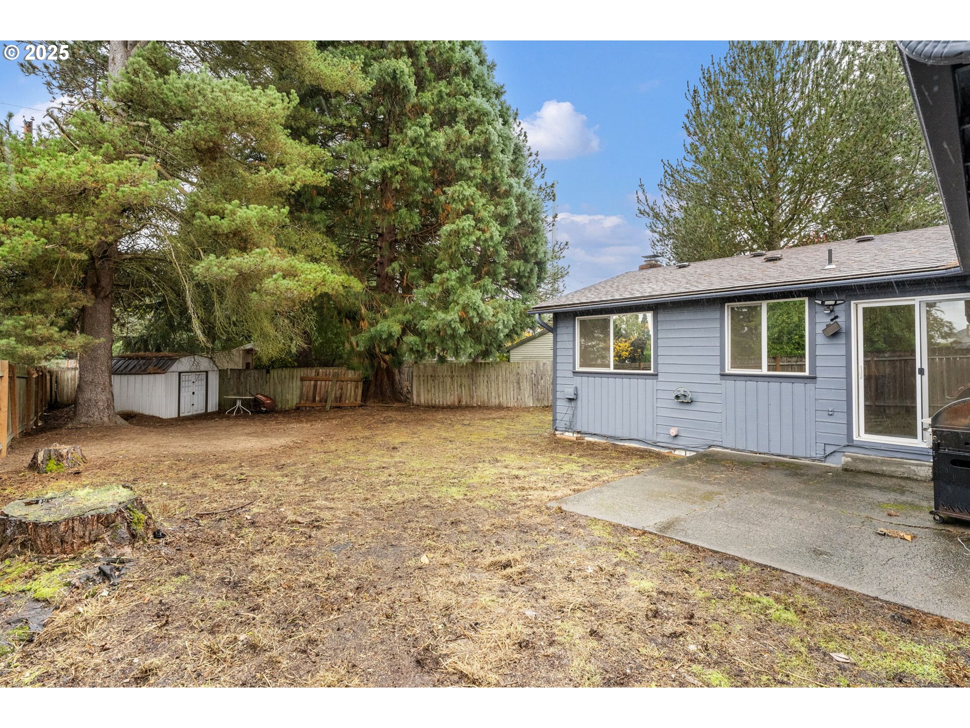 470 Southwest 194th Court Beaverton, OR 97006 - Photo 29 of 31 a view of a backyard with large trees