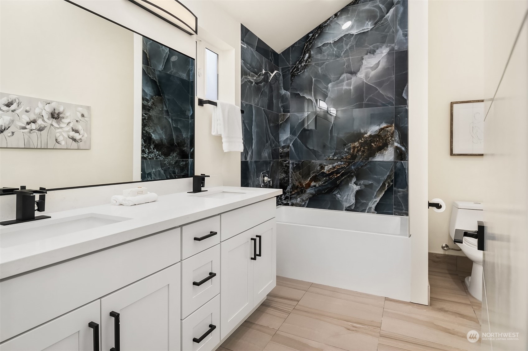 4915 South Genesee Street Seattle, WA 98118 - Photo 6 of 10 a bathroom with a sink and a mirror