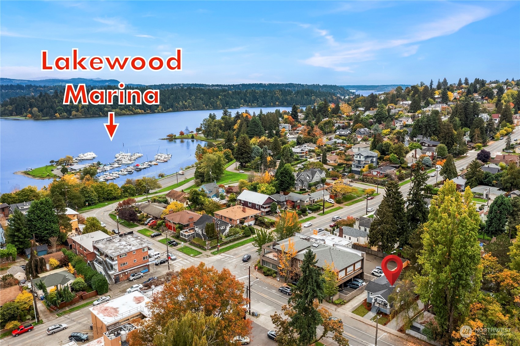 4915 South Genesee Street Seattle, WA 98118 - Photo 8 of 10 an aerial view of residential houses and street