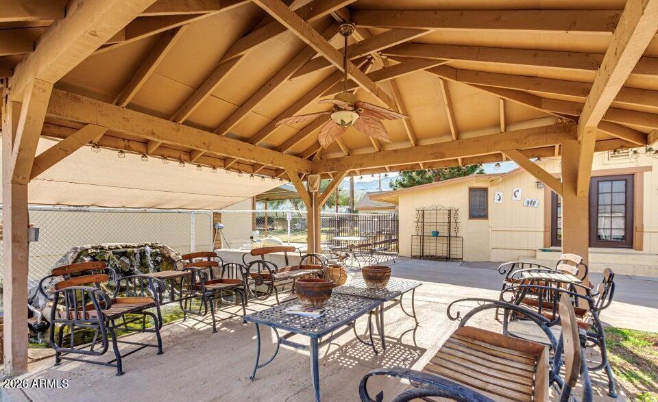 3232 West Carver Road Laveen, AZ 85339 - Photo 5 of 6 a view of a patio with table and chairs