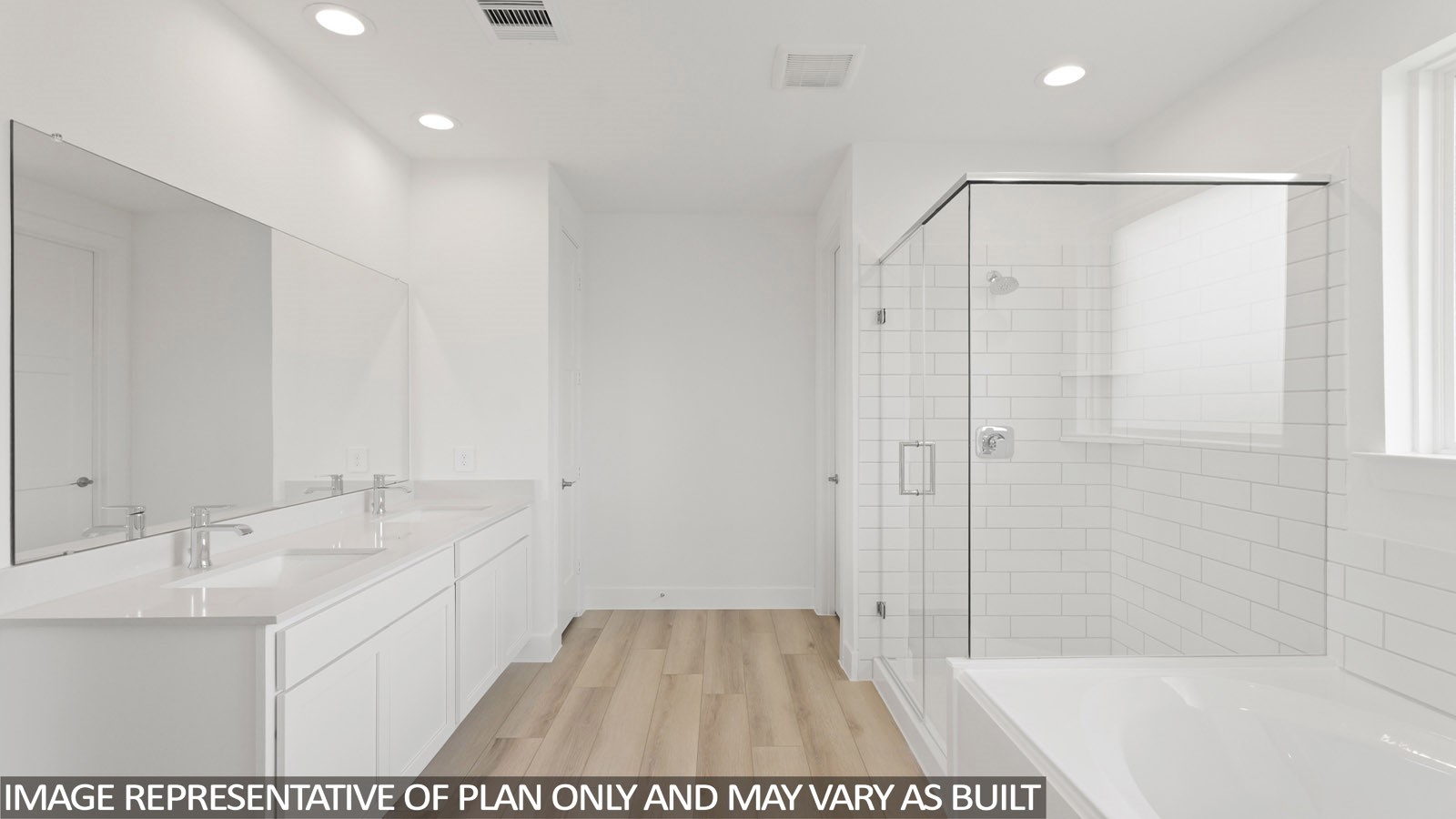 4613 Vernal Loop Conroe, TX 77303 - Photo 12 of 35 a bathroom with a sink and a mirror