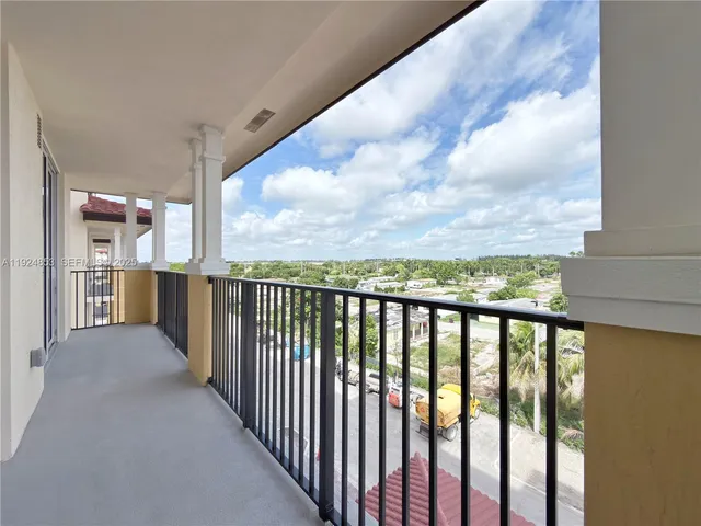 a view of a balcony with city view