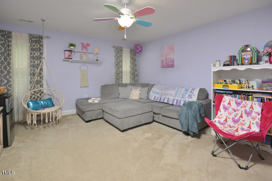 195 Timberwind Road Franklinton, NC 27525 - Photo 17 of 28 a living room with furniture and a table