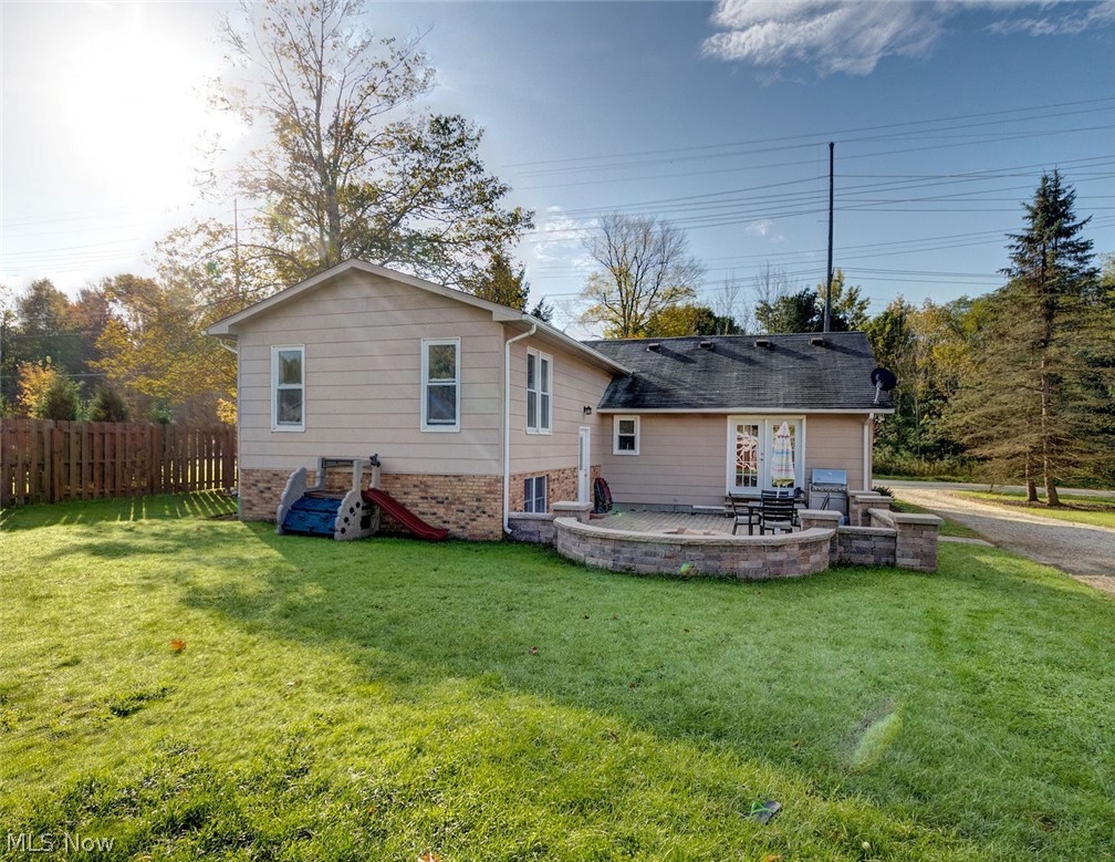 16192 Mayfield Road Huntsburg, OH 44046 - Photo 5 of 33 Back of home with oversized brick patio