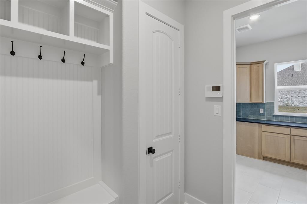 812 Vly Rdg Road Van Alstyne, TX 75495 - Photo 23 of 33 a bathroom with a shower and a sink
