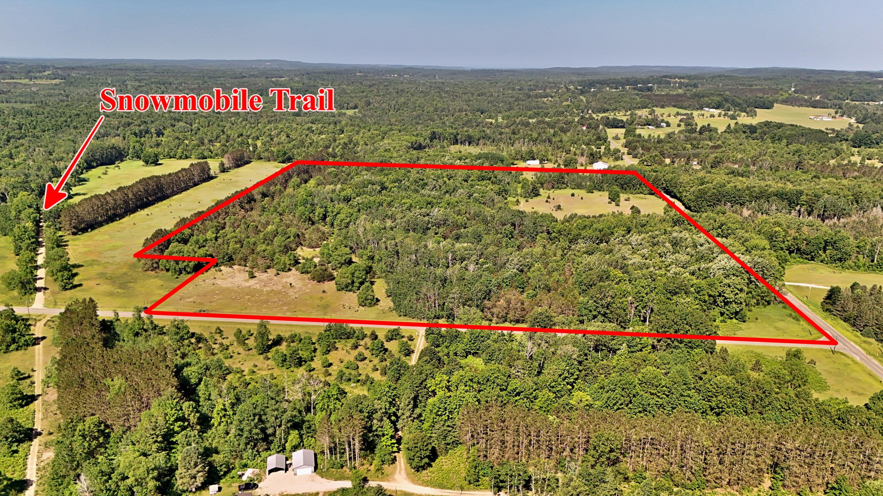 52-acres Tannerville Road Kaleva, MI 49645 - Photo 1 of 28 batch_DJI_20250623110224_0217_D lines