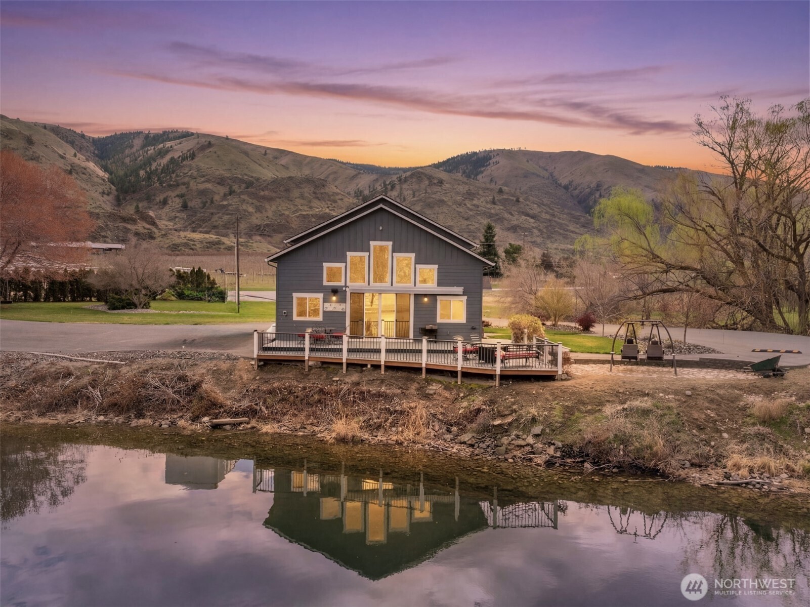 2 Playland Court Orondo, WA 98843 - Photo 2 of 40 a view of a town with mountains in the background