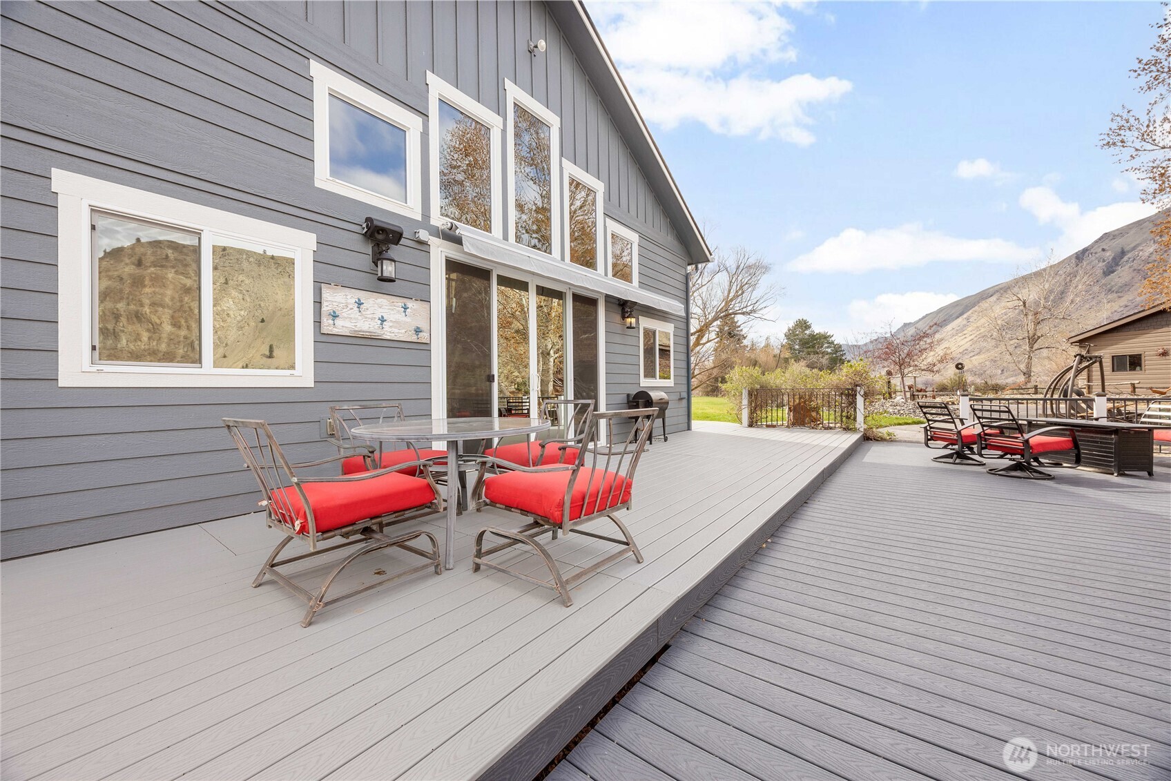 2 Playland Court Orondo, WA 98843 - Photo 22 of 40 a view of a deck with chairs and wooden floor