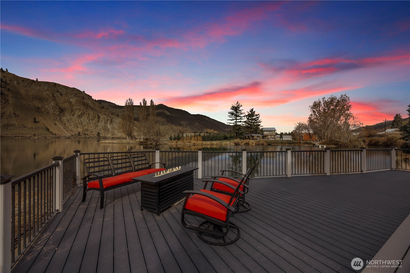 2 Playland Court Orondo, WA 98843 - Photo 23 of 40 a view of a roof deck with chair and wooden floor