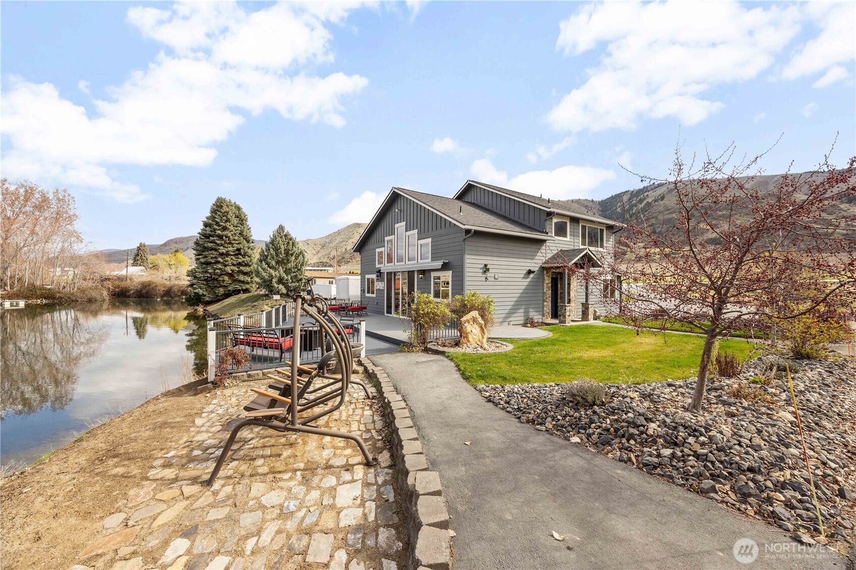 2 Playland Court Orondo, WA 98843 - Photo 26 of 40 a view of a house with a yard and fence