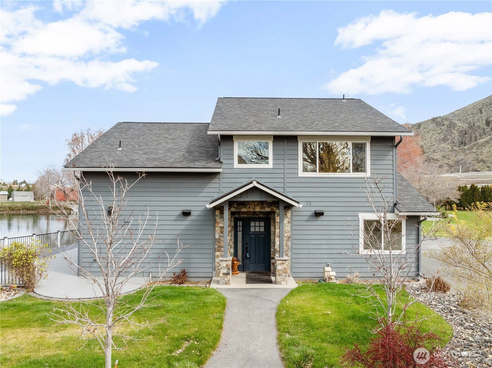 2 Playland Court Orondo, WA 98843 - Photo 28 of 40 a front view of a house with garden