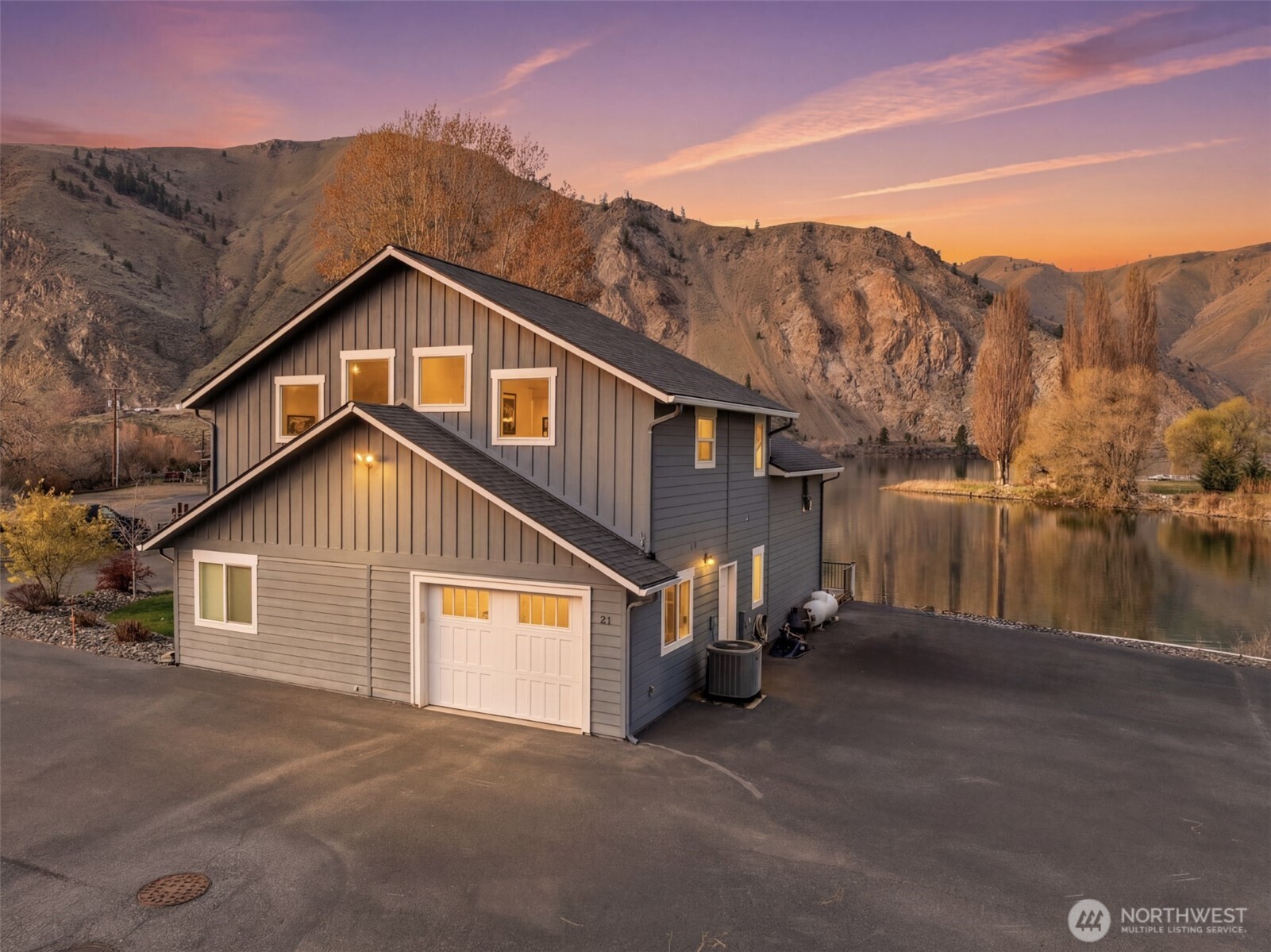 2 Playland Court Orondo, WA 98843 - Photo 3 of 40 a view of a house with a yard