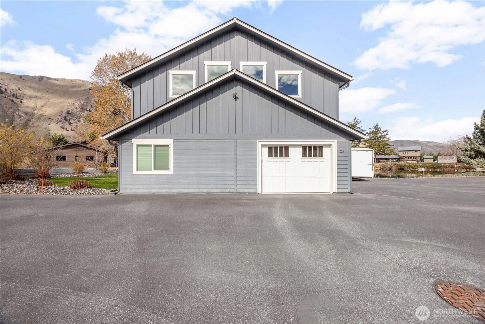 2 Playland Court Orondo, WA 98843 - Photo 32 of 40 a view of a house with a street