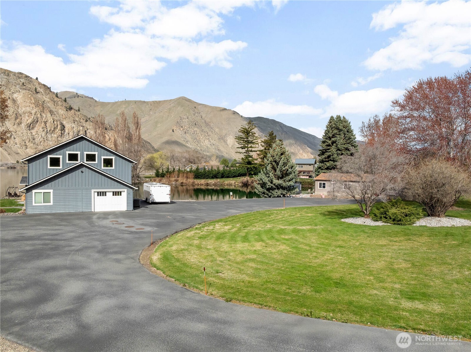 2 Playland Court Orondo, WA 98843 - Photo 36 of 40 a view of a house with a yard