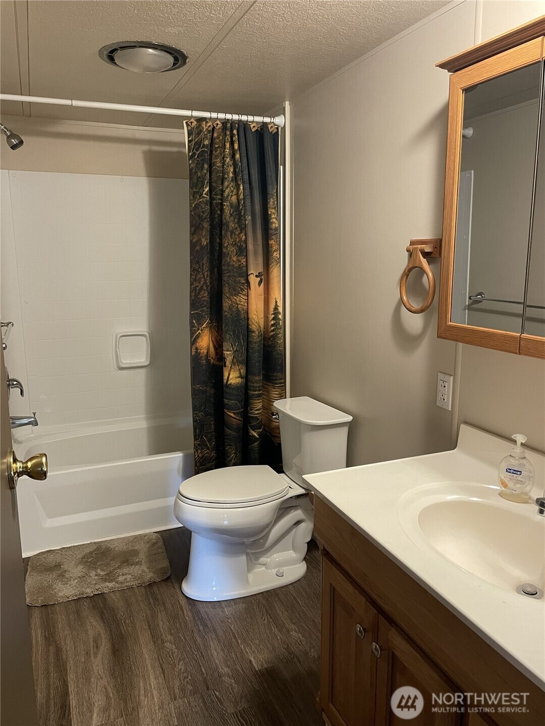 2 Playland Court Orondo, WA 98843 - Photo 38 of 40 a bathroom with a sink toilet and shower