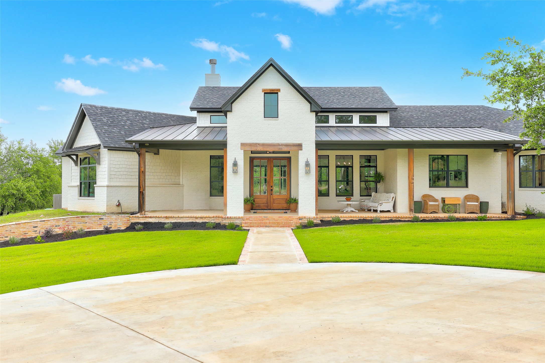 7670 Shiny Top Ranch Lane Salado, TX 76571 - Photo 3 of 40 a front view of a house with a yard and porch