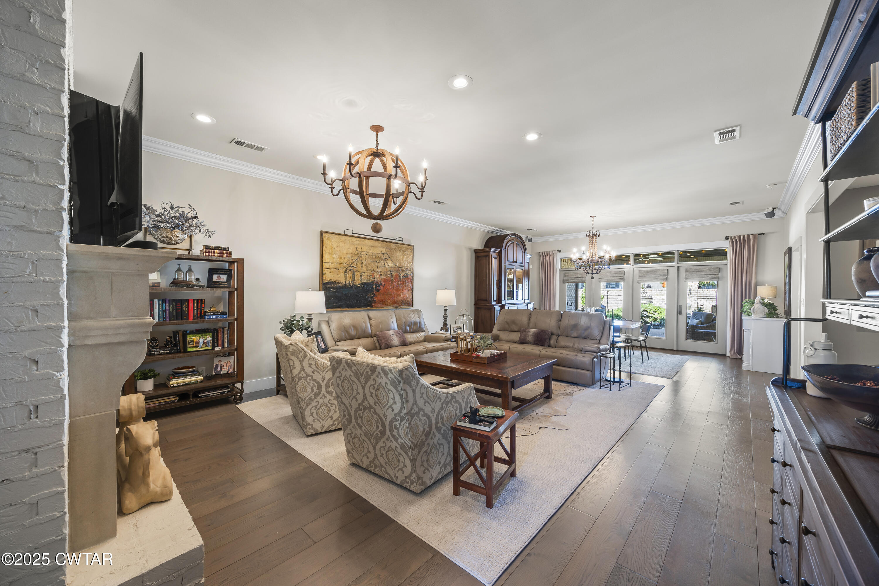 79 Water Ridge Place Jackson, TN 38305 - Photo 11 of 39 a living room with furniture and a flat screen tv