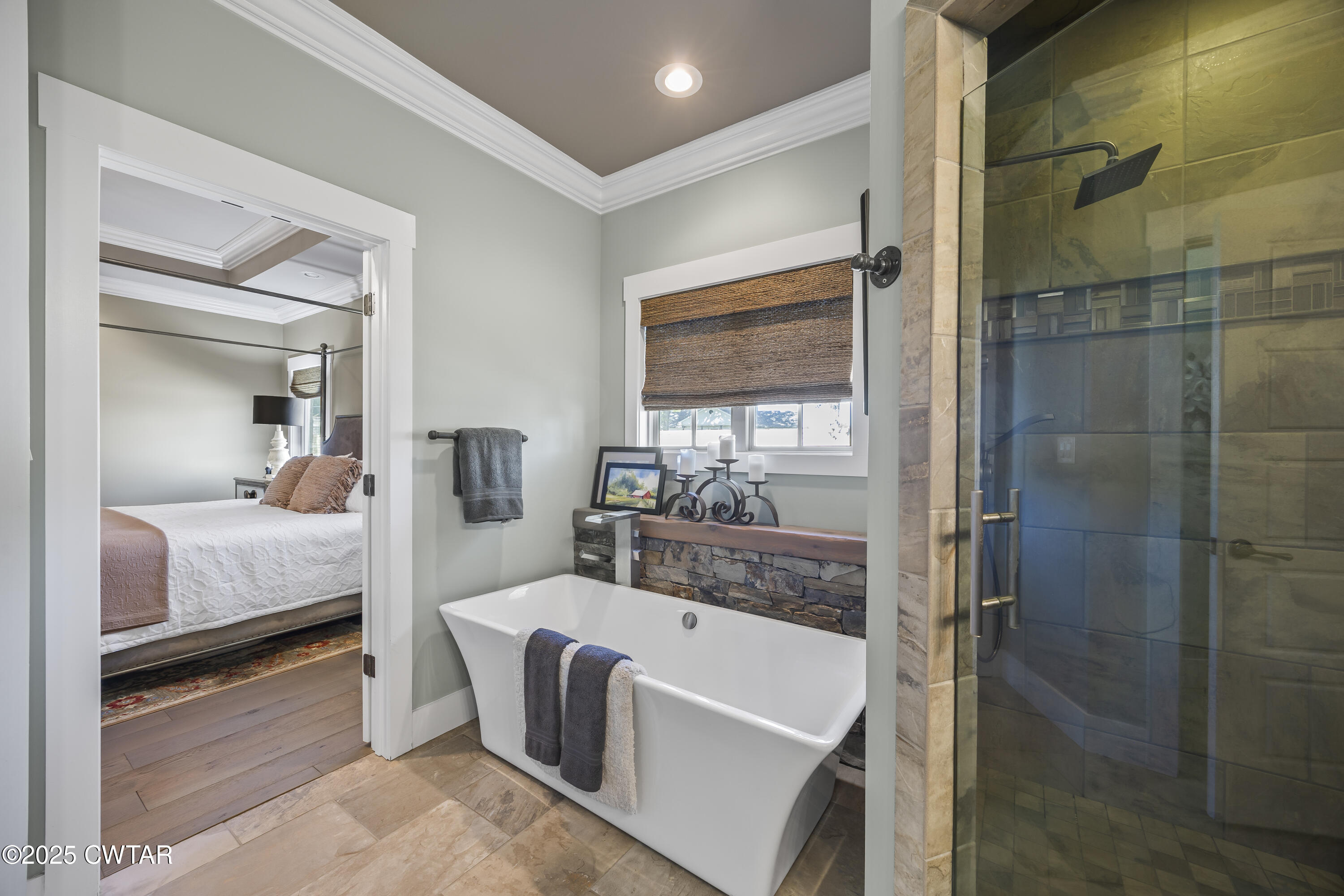 79 Water Ridge Place Jackson, TN 38305 - Photo 21 of 39 a bedroom with a bed and a mirror