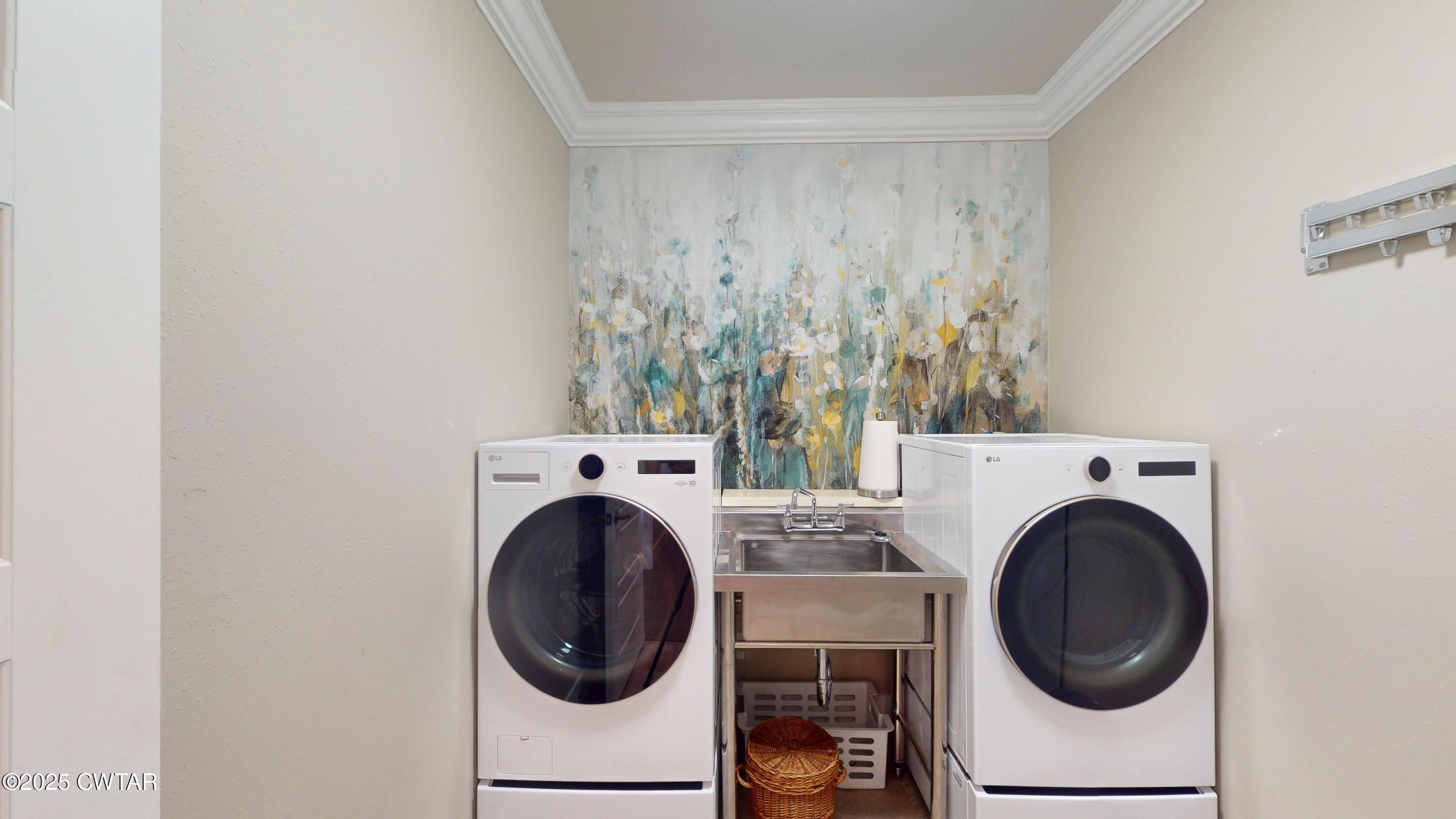 79 Water Ridge Place Jackson, TN 38305 - Photo 33 of 39 a utility room with dryer and washer
