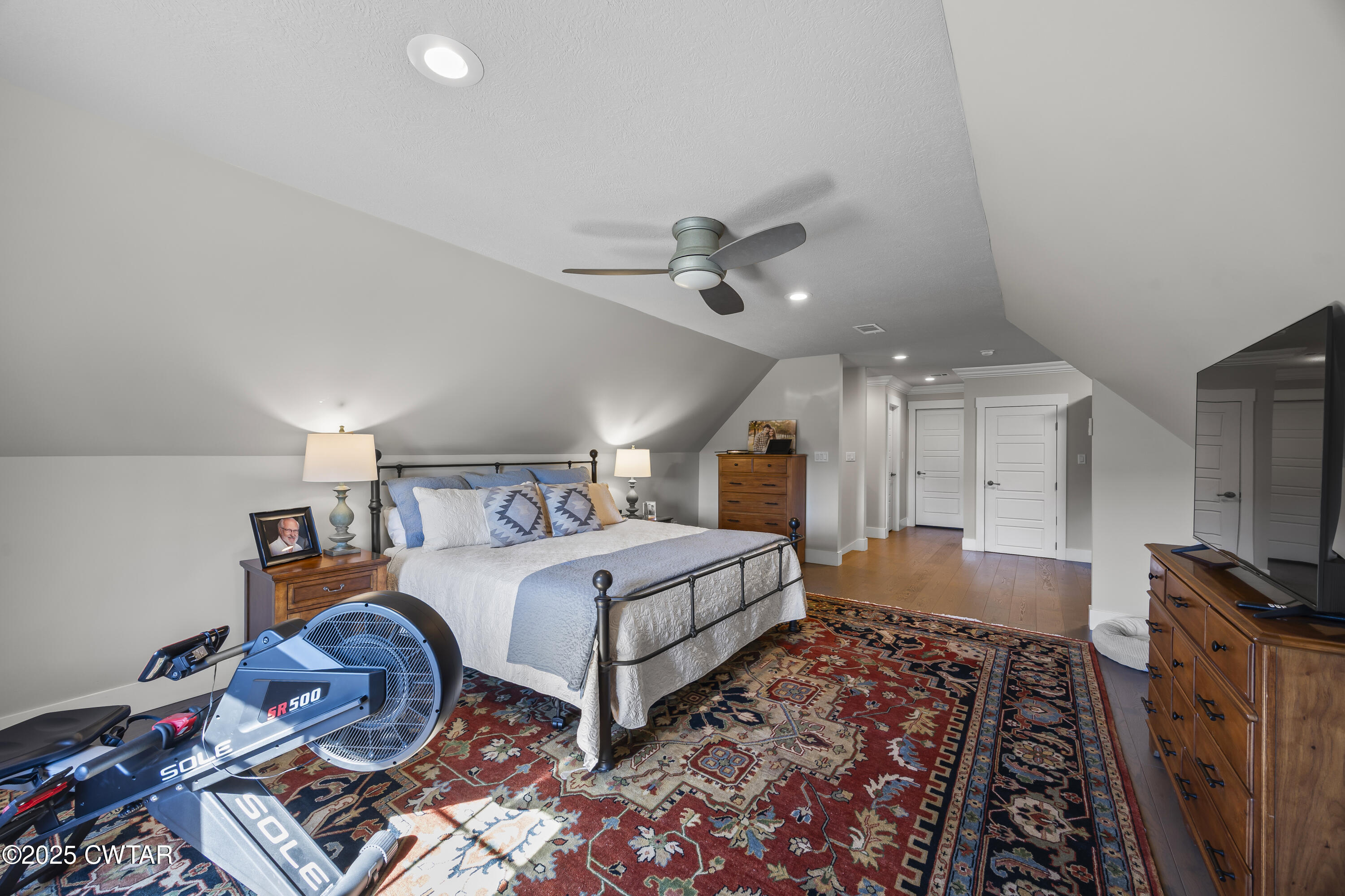 79 Water Ridge Place Jackson, TN 38305 - Photo 35 of 39 a bedroom with bed and a flat tv screen on dresser