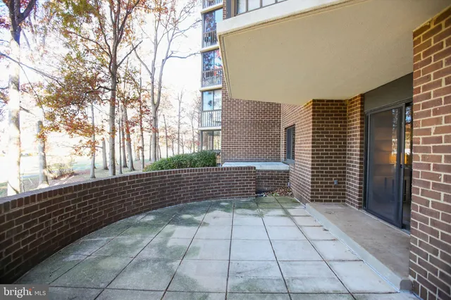 a view of a yard from a balcony