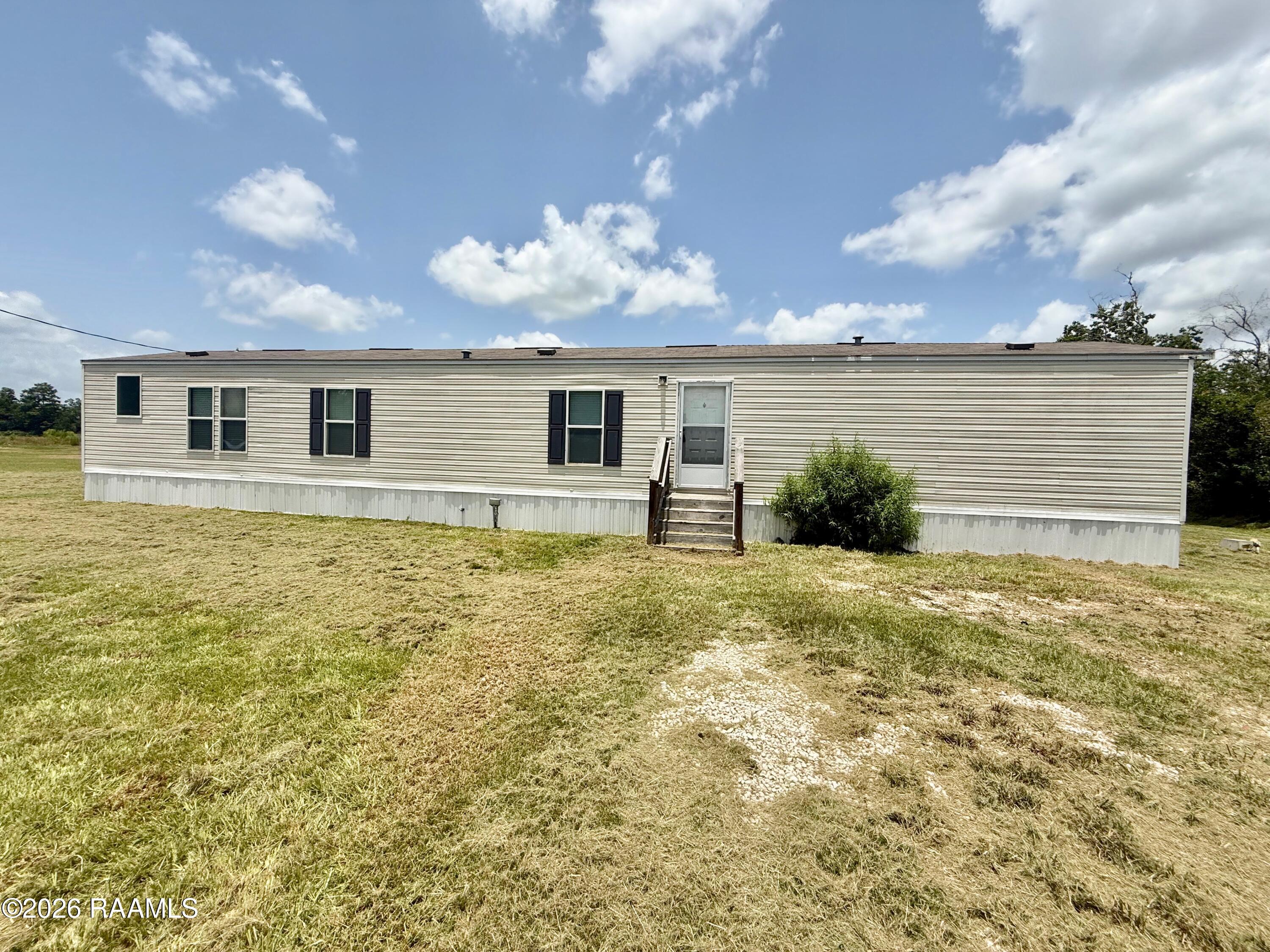 22326 Pine Hill Cemetery Road Iowa, LA 70647 - Photo 1 of 34 front