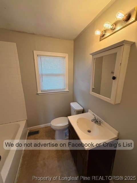 503 Longview Drive Fayetteville, NC 28311 - Photo 7 of 10 a bathroom with a sink a toilet and mirror