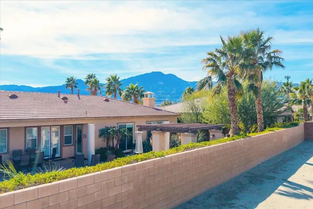 a view of a city with an ocean view