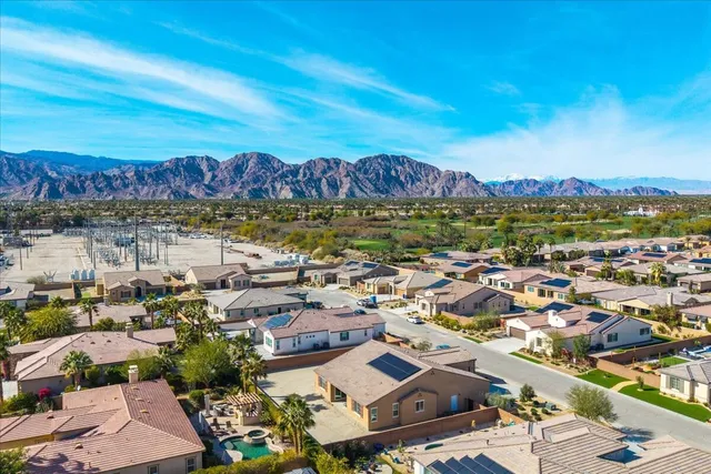 an aerial view of residential building with parking space
