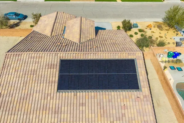 a front view of a house with a garage