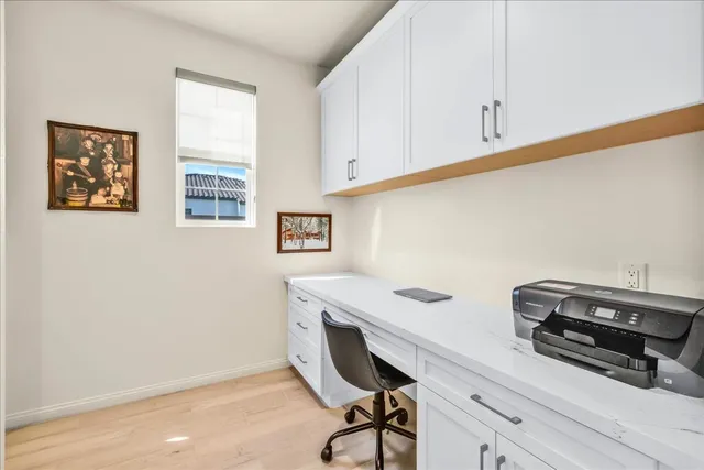 a view of workspace with wooden floor workspace
