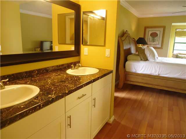 1821 Southwest Palm City Road, Unit B102 Stuart, FL 34994 - Photo 11 of 18 Master Bath/Spa. Granite counter-top and dual sinks in Master bath