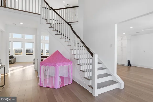 a bedroom with a bed and a television