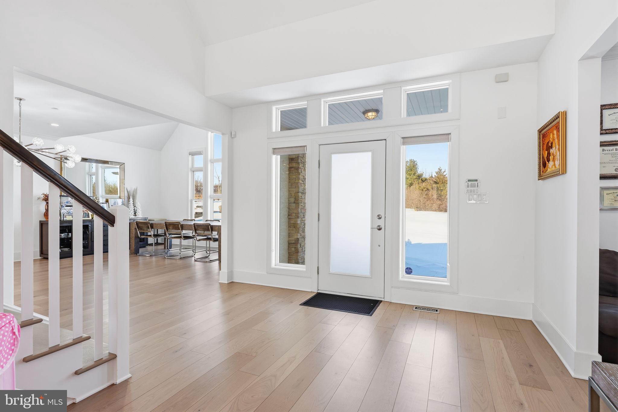 2145 Second Street Pike Newtown, PA 18940 - Photo 18 of 79 a view of a livingroom with wooden floor and stairs