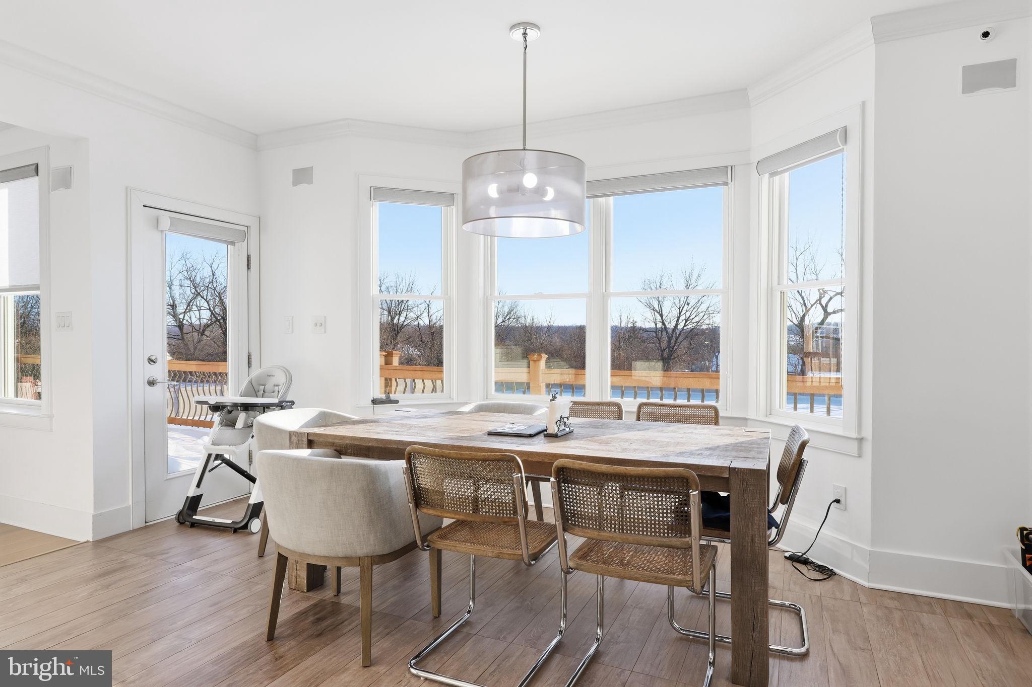 2145 Second Street Pike Newtown, PA 18940 - Photo 27 of 79 a view of a dining room with furniture window and wooden floor