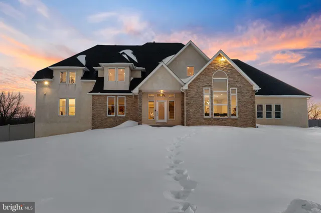 a view of a house with a road