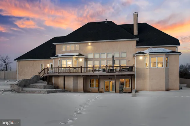 a front view of a house with a ocean view