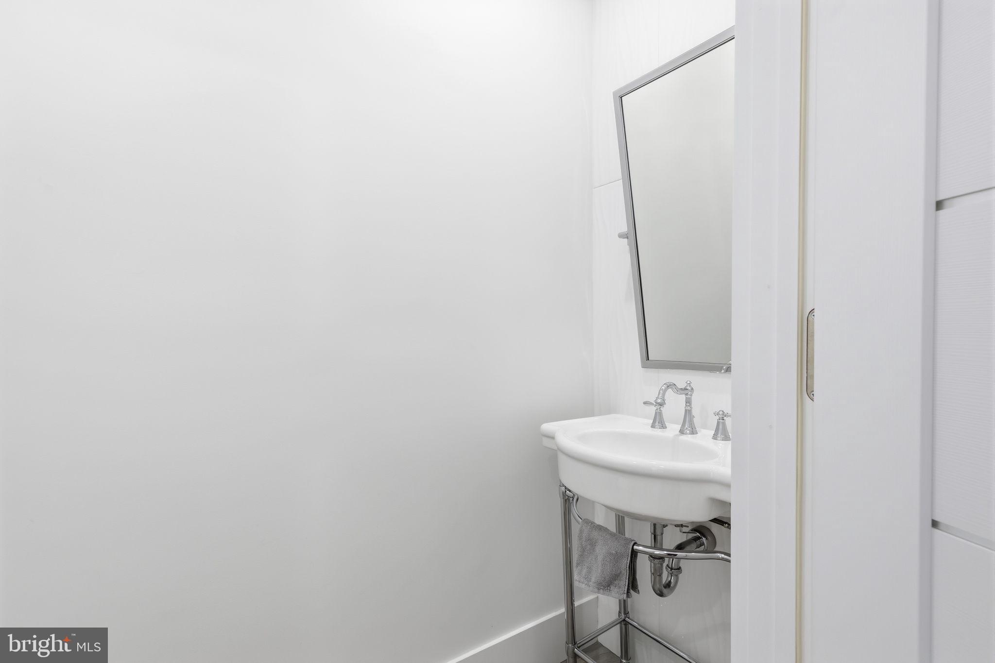 2145 Second Street Pike Newtown, PA 18940 - Photo 56 of 79 a bathroom with a sink and a mirror