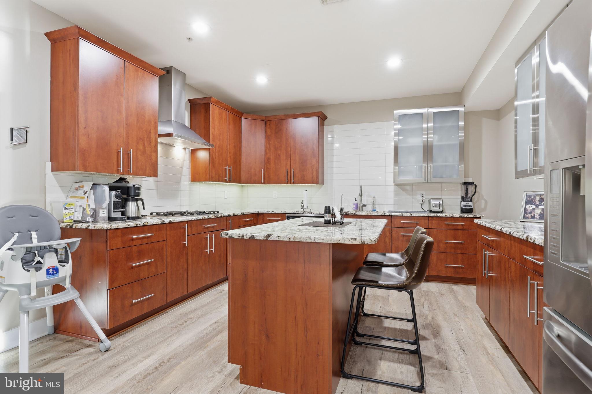 2145 Second Street Pike Newtown, PA 18940 - Photo 61 of 79 a kitchen with stainless steel appliances granite countertop sink refrigerator and microwave