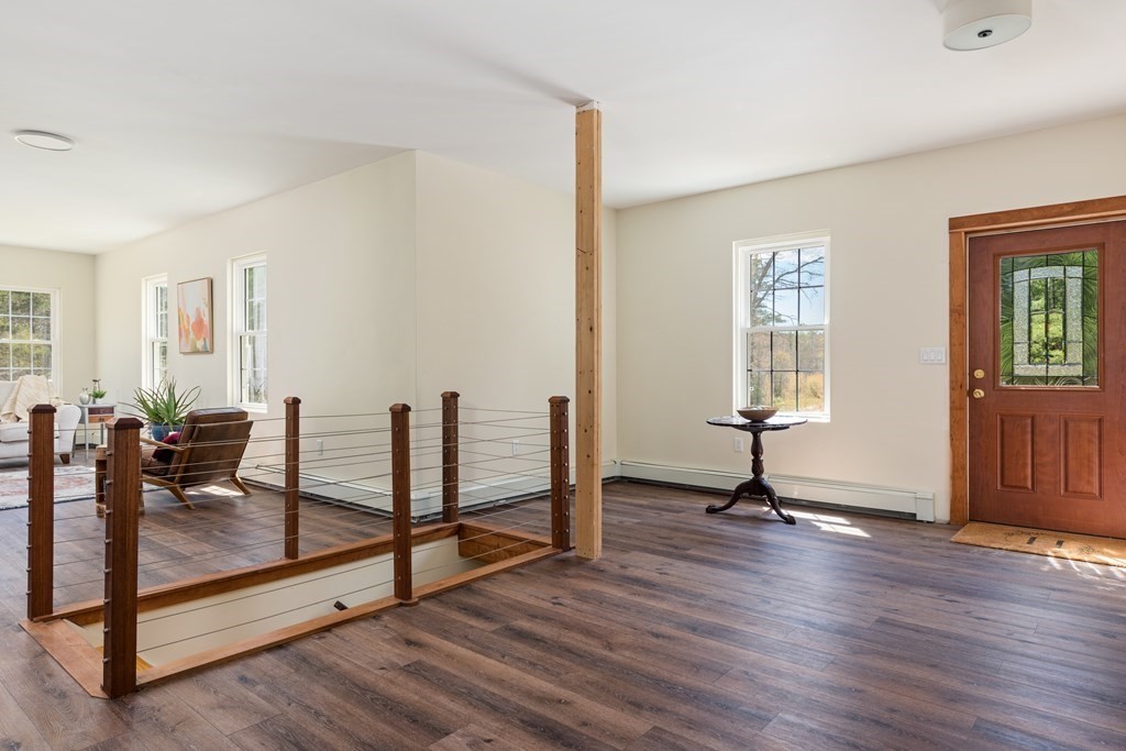 249 Blackmore Pond Road Wareham, MA 02576 - Photo 10 of 41 a view of a livingroom with furniture and a window
